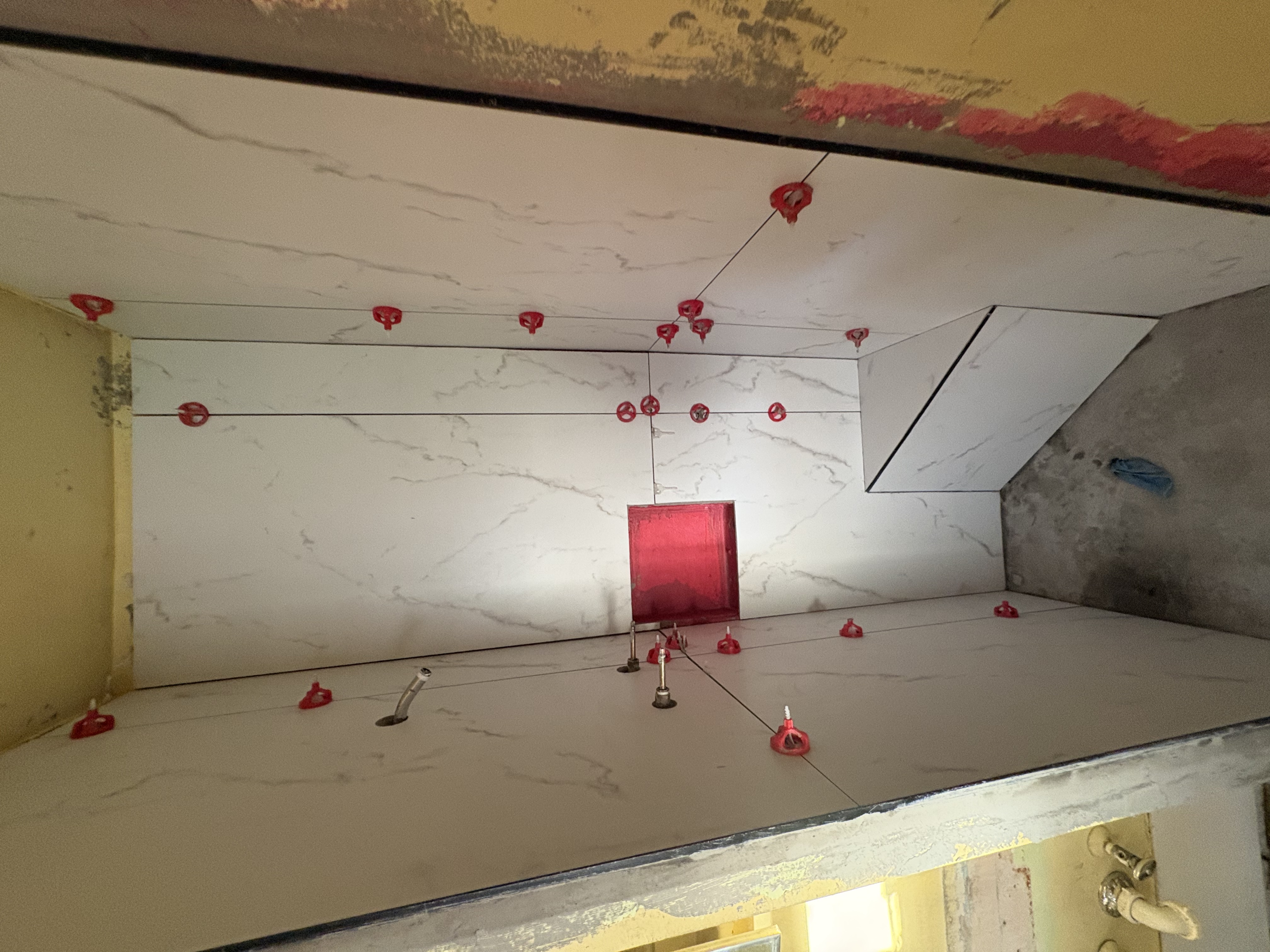 Fresh shower install — tile in progress
