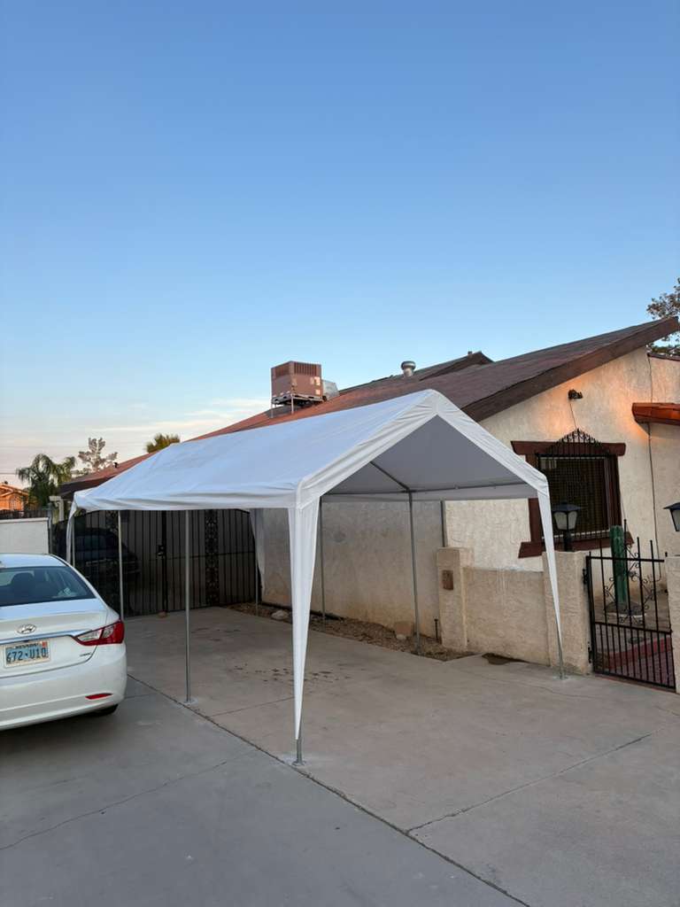 Carport canopy over a driveway, side view