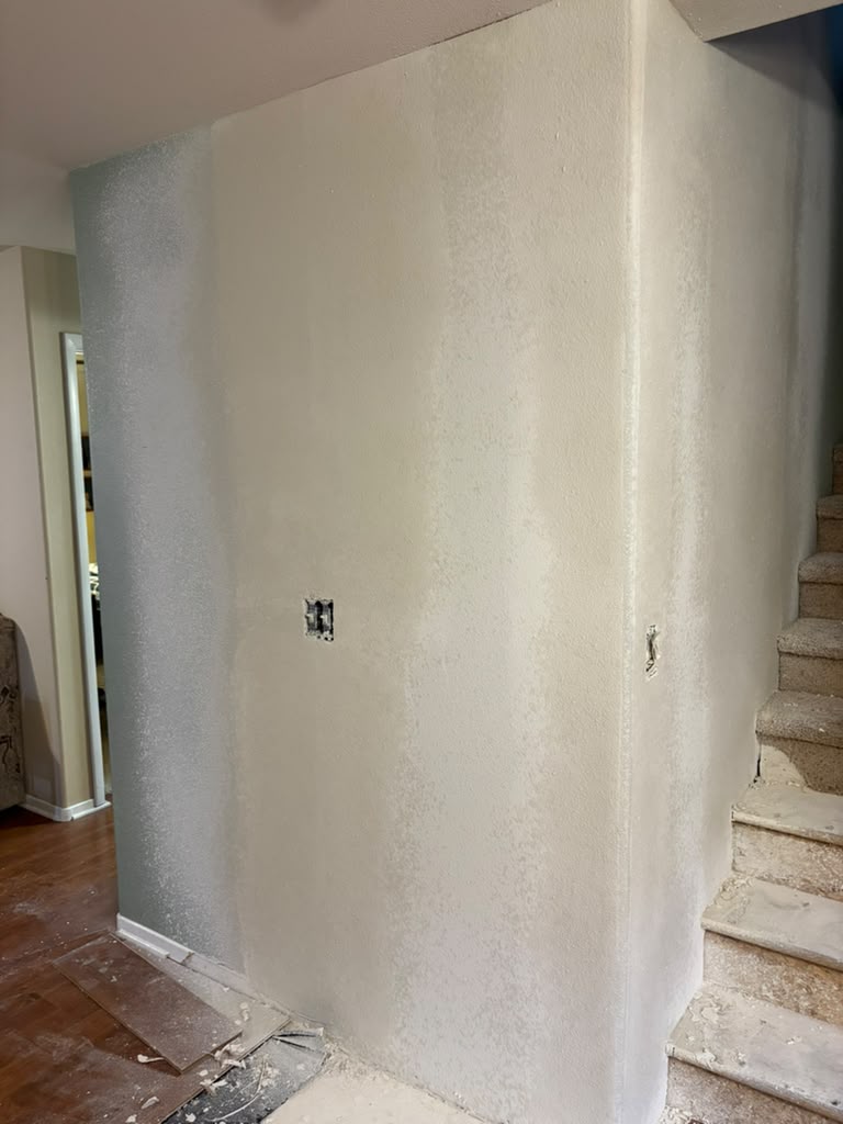 Texture blended over the new drywall to match the house